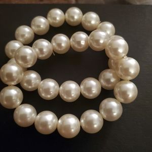 2 faux elastic pearl bracelets 3"each